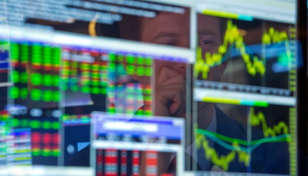 AI Boom Fuels Wall Street Gains as Bubble Warnings Grow